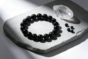 Obsidian Bracelet: Spiritual Protection, Healing Properties, and How to Wear obsidian bracelet on selenite under moonlight