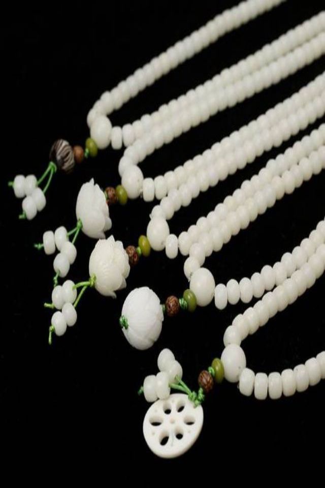 White Bodhi mala collection with lotus charms White Bodhi 108 Mala: Zen & Mindful Connection - Image 4